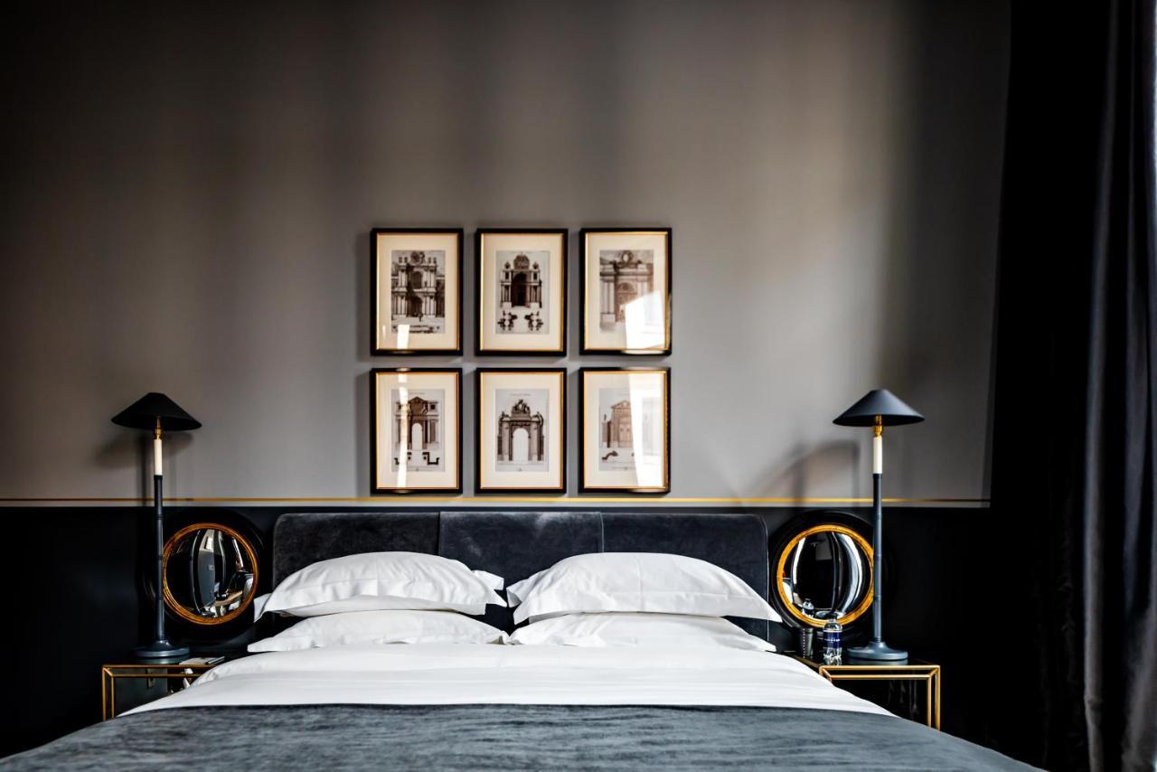 무슈 조지 호텔 앤 스파 샹 젤리제 파리 외부 사진 A bedroom at the Hotel de Matignon